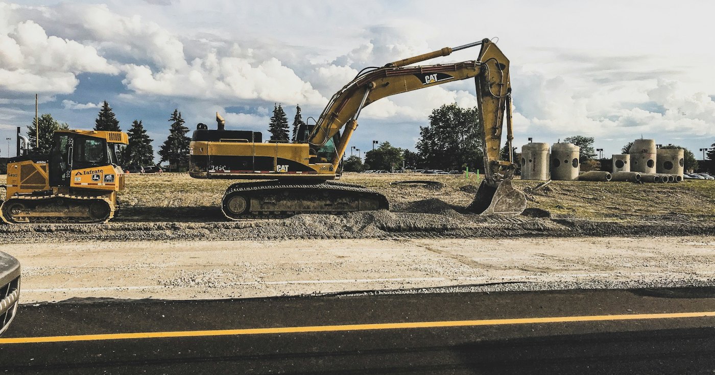 An excavator digging at a construction site